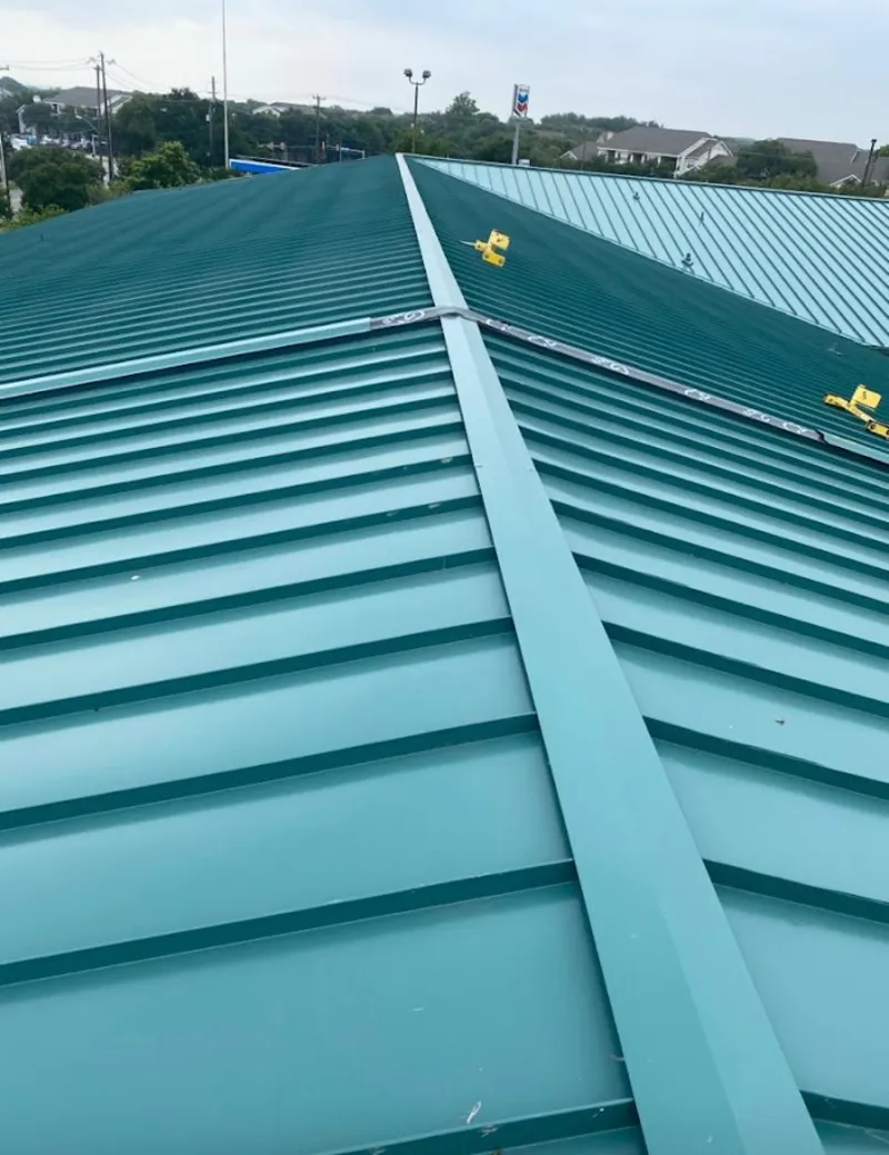 Green commercial metal roof ridge and valley for Metal Roof Repair in Northridge